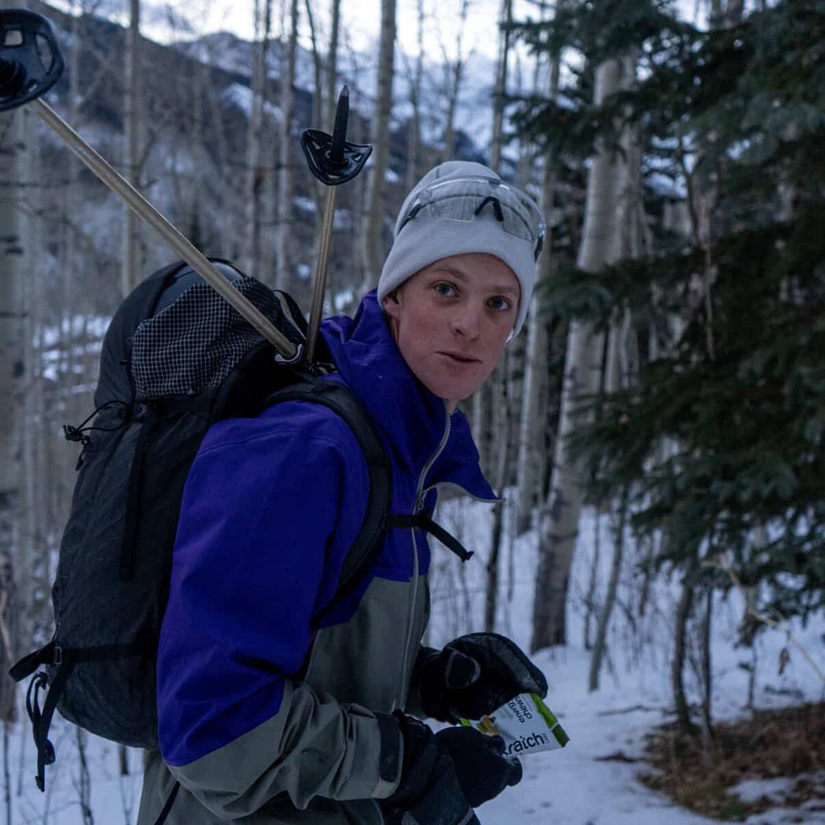 Person wearing the Thurston Wind Pro® Beanie in glacier grey / black, lifestyle photo